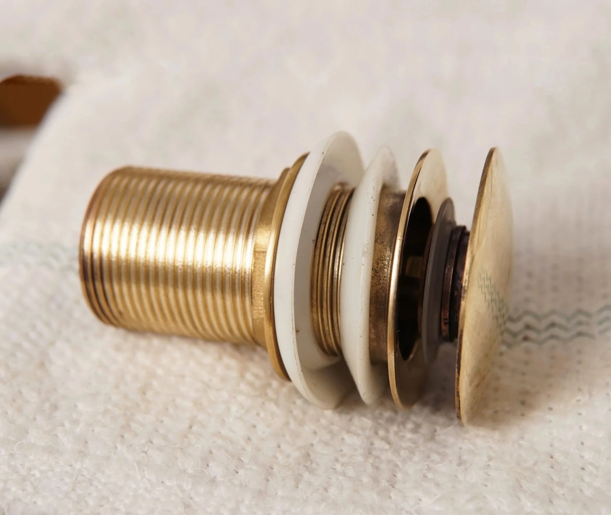 Solid Brass Drain, Push Up Button - handcrafted luxury Hardware and Drains for kitchen and bathroom interiors by Brooklyn Brass