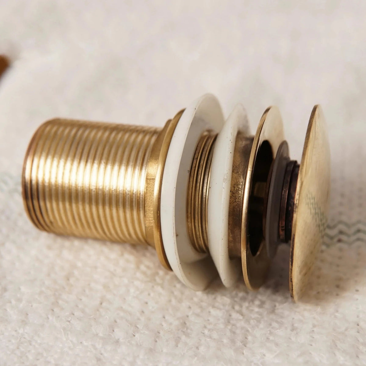 Unlacquered Brass Bathroom Sink Drain, Basin Sink Stopper, Pop up Drain - handcrafted luxury Hardware and Drains for kitchen and bathroom interiors by Brooklyn Brass