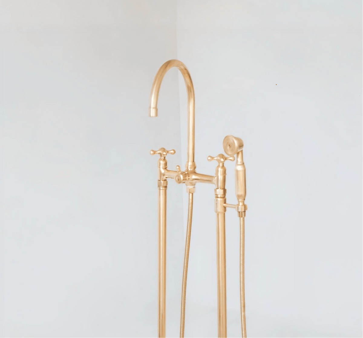 Unlacquered Brass Floor Mounted Bath Tub Filler - handcrafted luxury Showers for kitchen and bathroom interiors by Brooklyn Brass