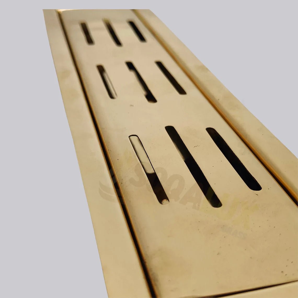 Unlacquered Brass Linear Floor Drain for Modern Bathrooms - handcrafted luxury Hardware and Drains for kitchen and bathroom interiors by Brooklyn Brass