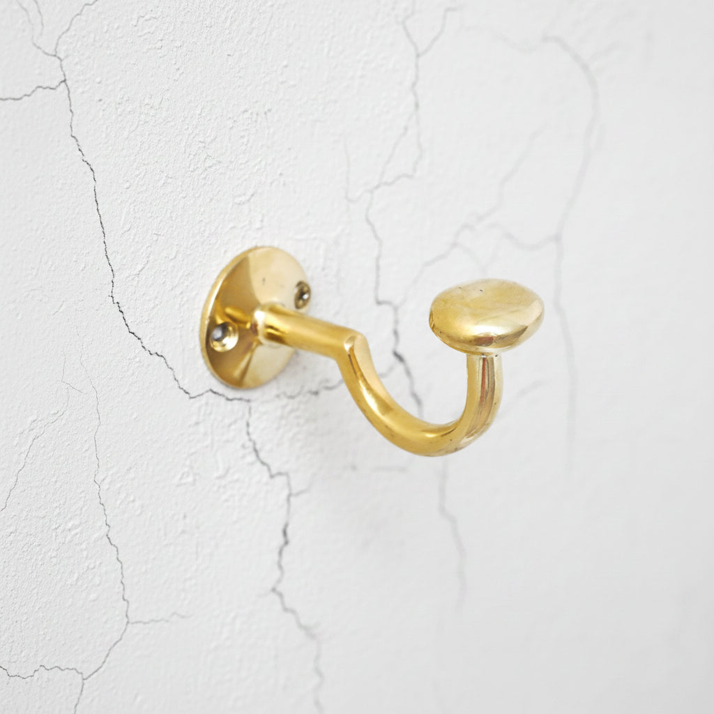 Unlacquered Solid Brass Curved Hook - handcrafted luxury for kitchen and bathroom interiors by Brooklyn Brass