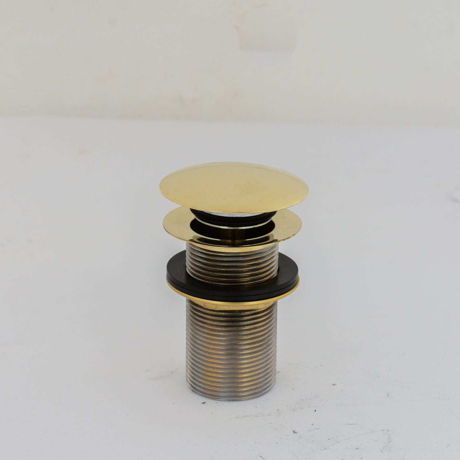 Solid Brass Drain, Push Up Button - handcrafted luxury Hardware and Drains for kitchen and bathroom interiors by Brooklyn Brass