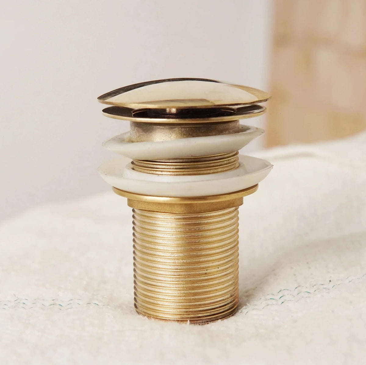 Unlacquered Brass Bathroom Sink Drain, Basin Sink Stopper, Pop up Drain - handcrafted luxury Hardware and Drains for kitchen and bathroom interiors by Brooklyn Brass