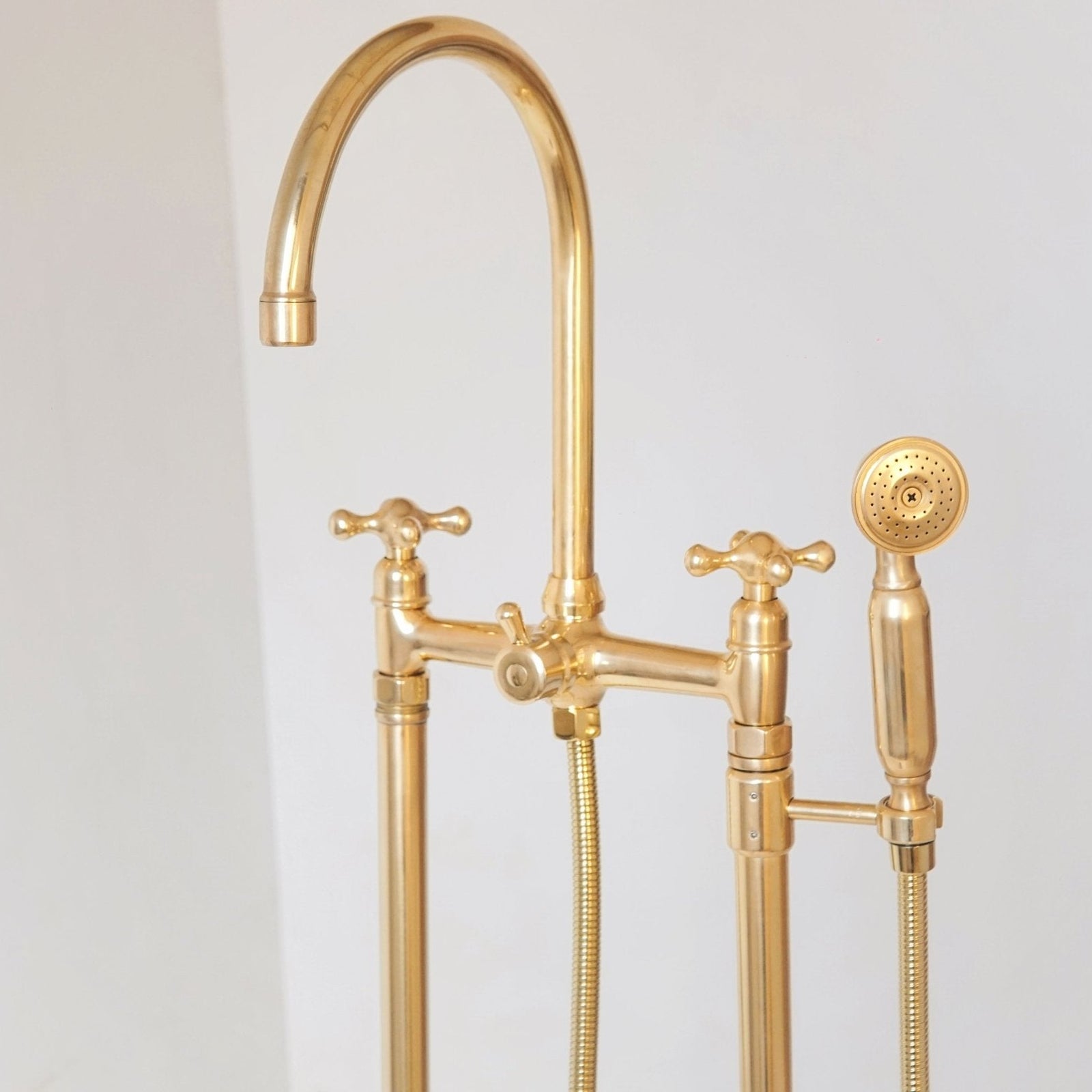 Unlacquered Brass Floor Mounted Bath Tub Filler - handcrafted luxury Showers for kitchen and bathroom interiors by Brooklyn Brass
