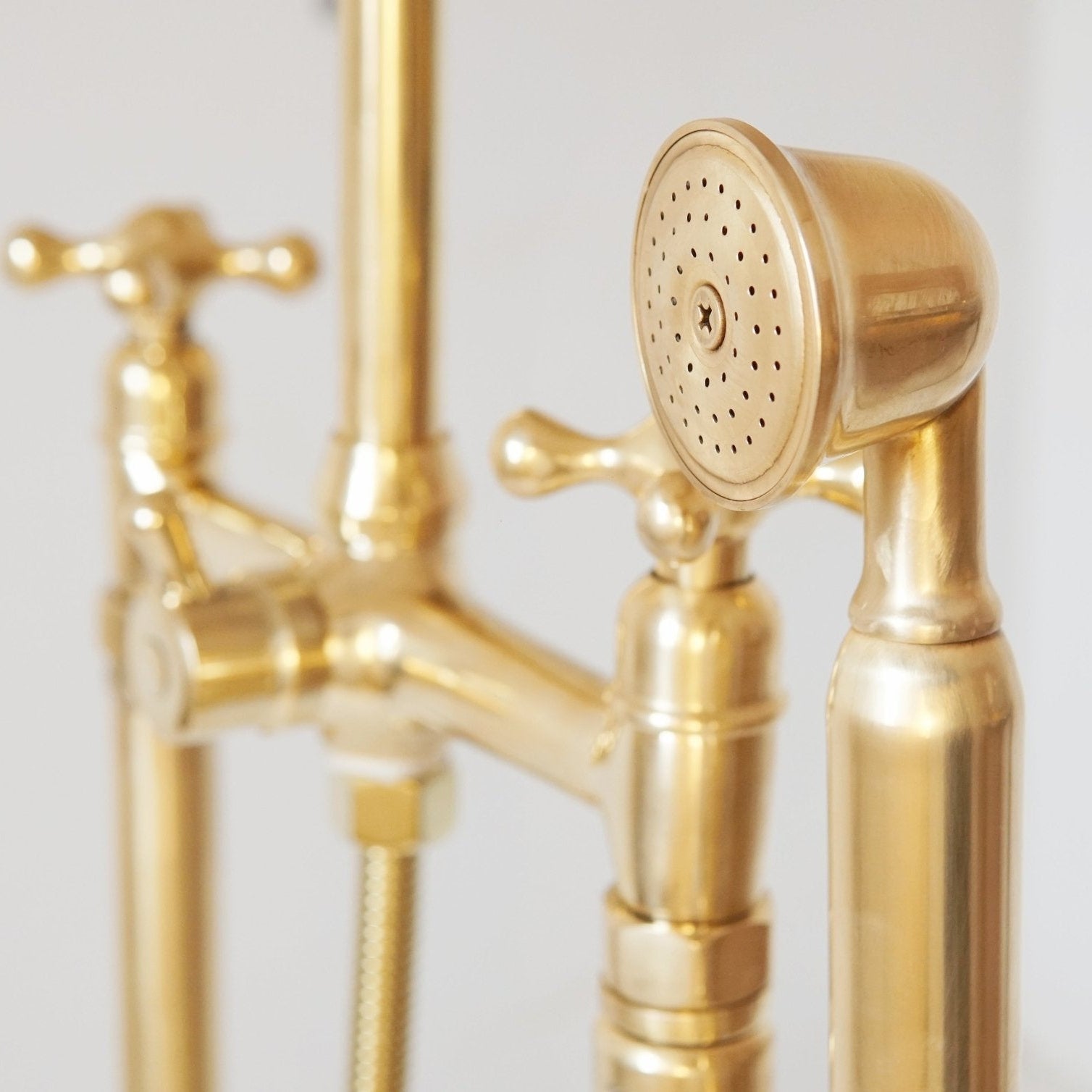Unlacquered Brass Floor Mounted Bath Tub Filler - handcrafted luxury Showers for kitchen and bathroom interiors by Brooklyn Brass