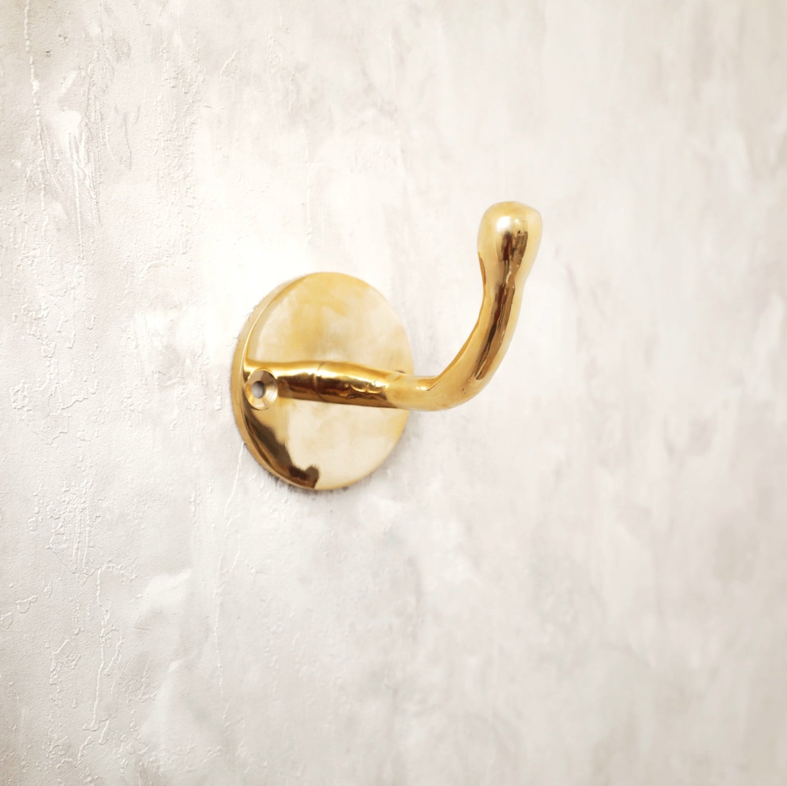 Unlacquered Brass Hook For Wall - handcrafted luxury Hardware and Drains for kitchen and bathroom interiors by Brooklyn Brass